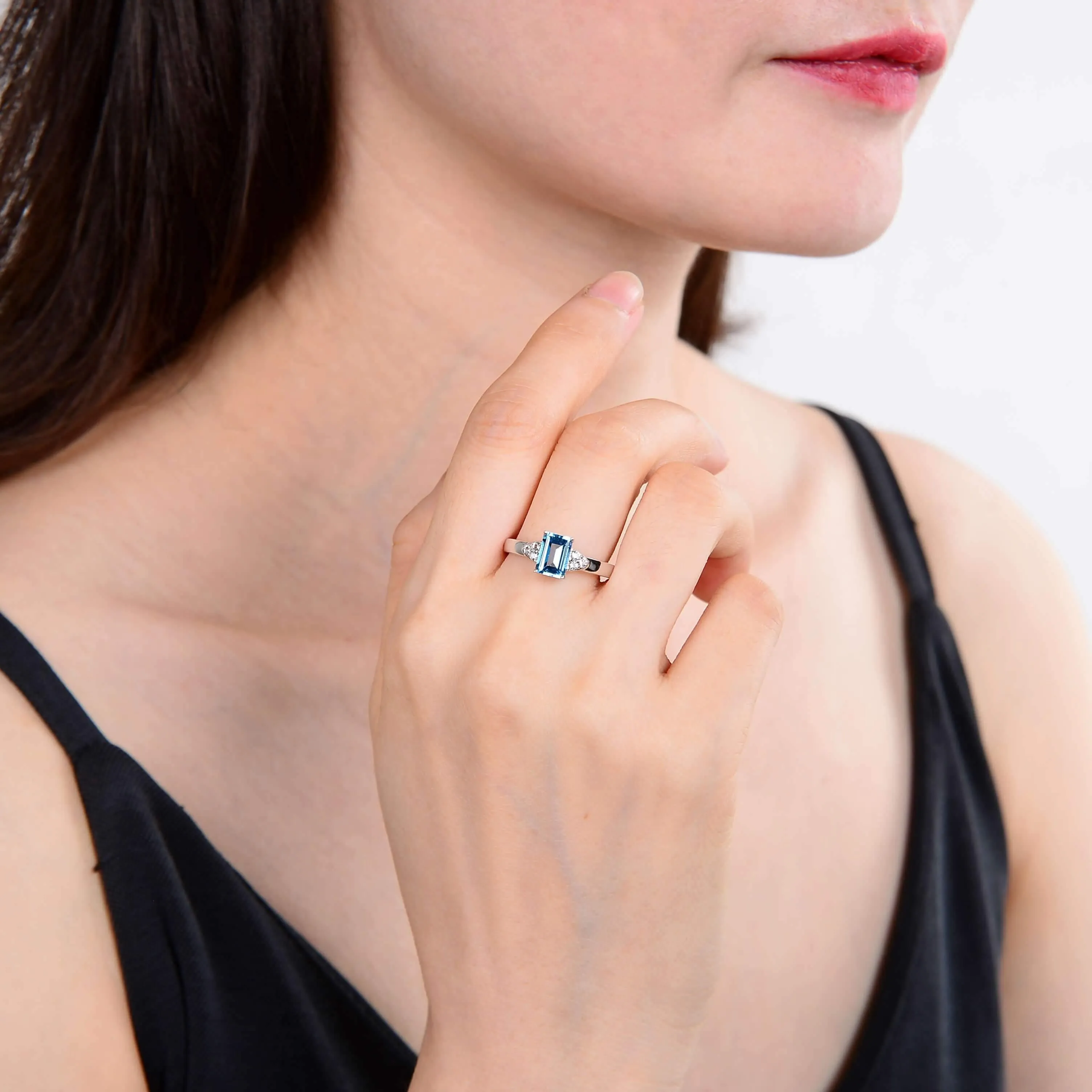 Blue Topaz Emerald Cut Solitaire Ring