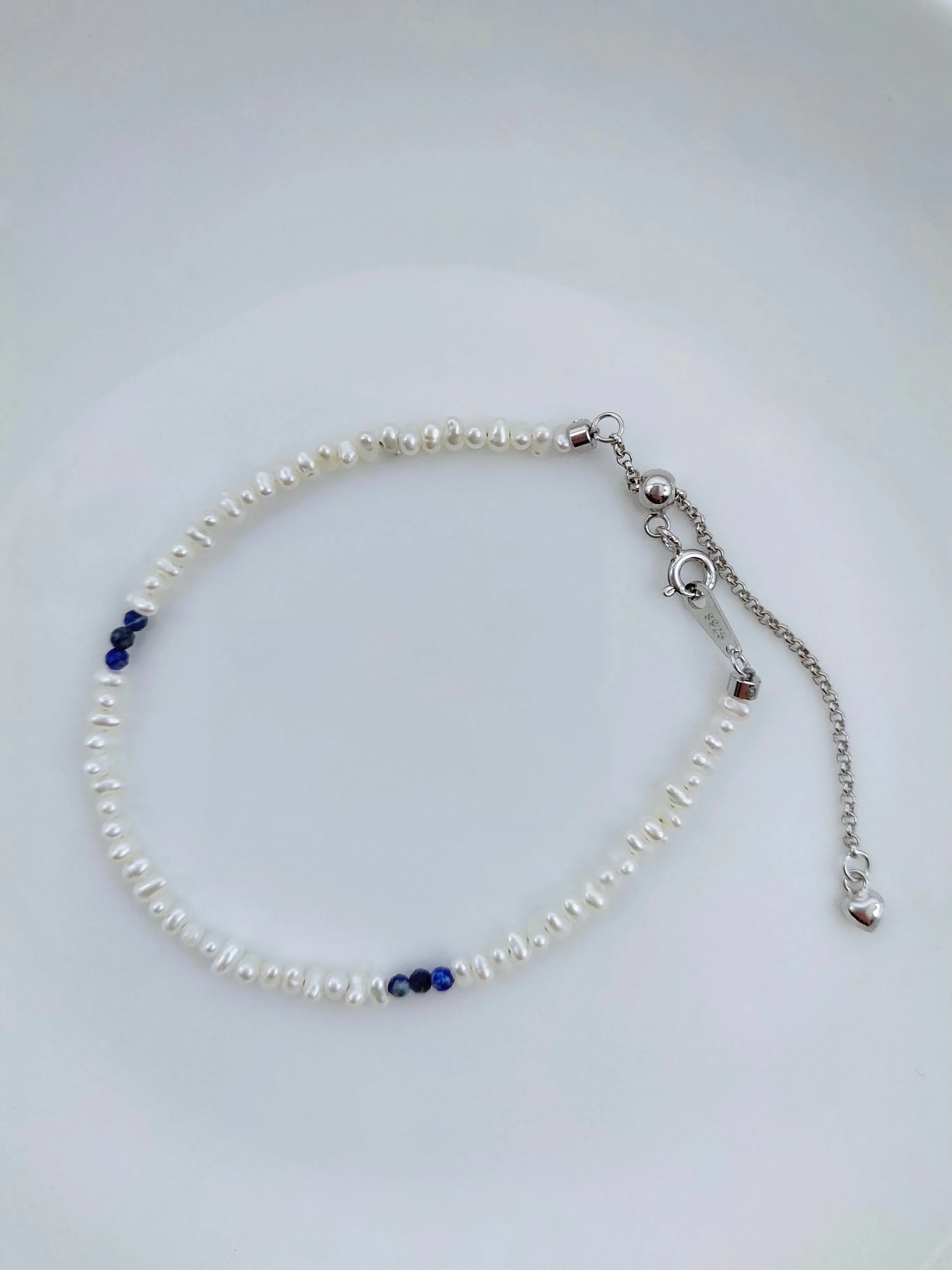 MINI FRESHWATER KESHI PEARL BRACELET WITH NATURAL LAPIS LAZULI