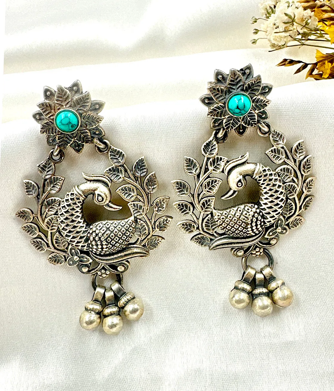 The Adhit Silver Peacock Earrings