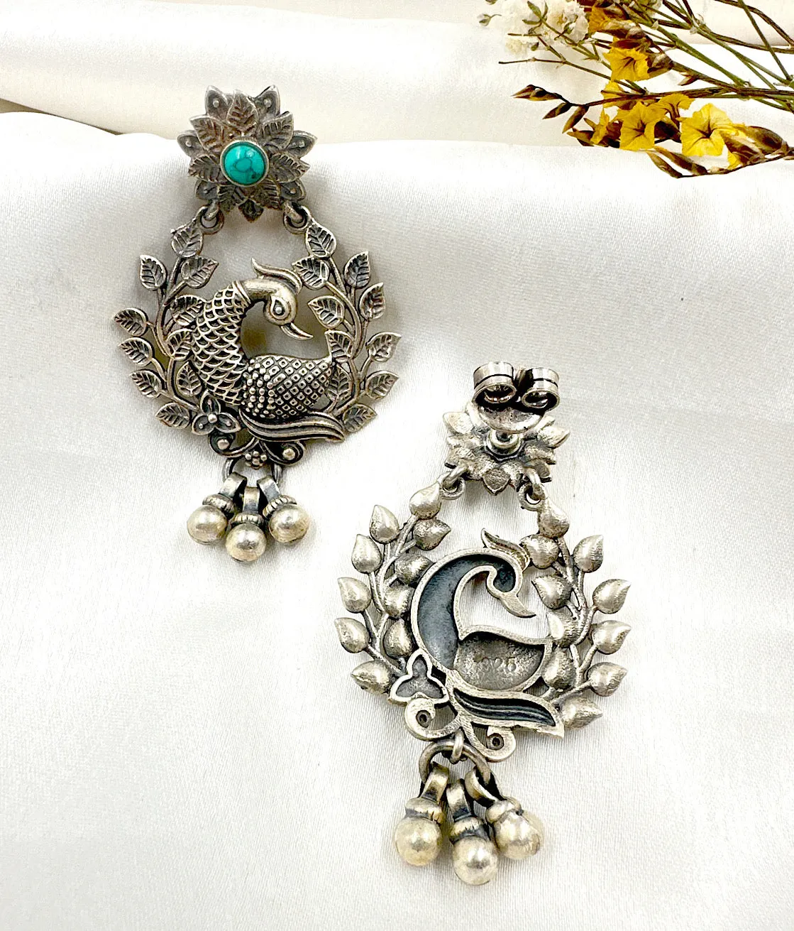 The Adhit Silver Peacock Earrings